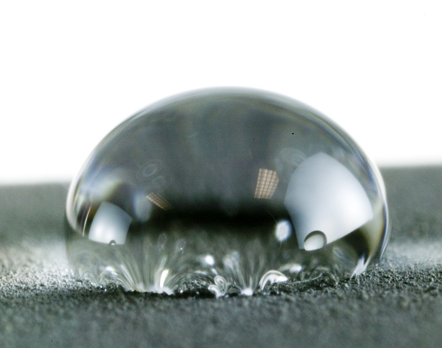 water Droplet repelling against glass surface