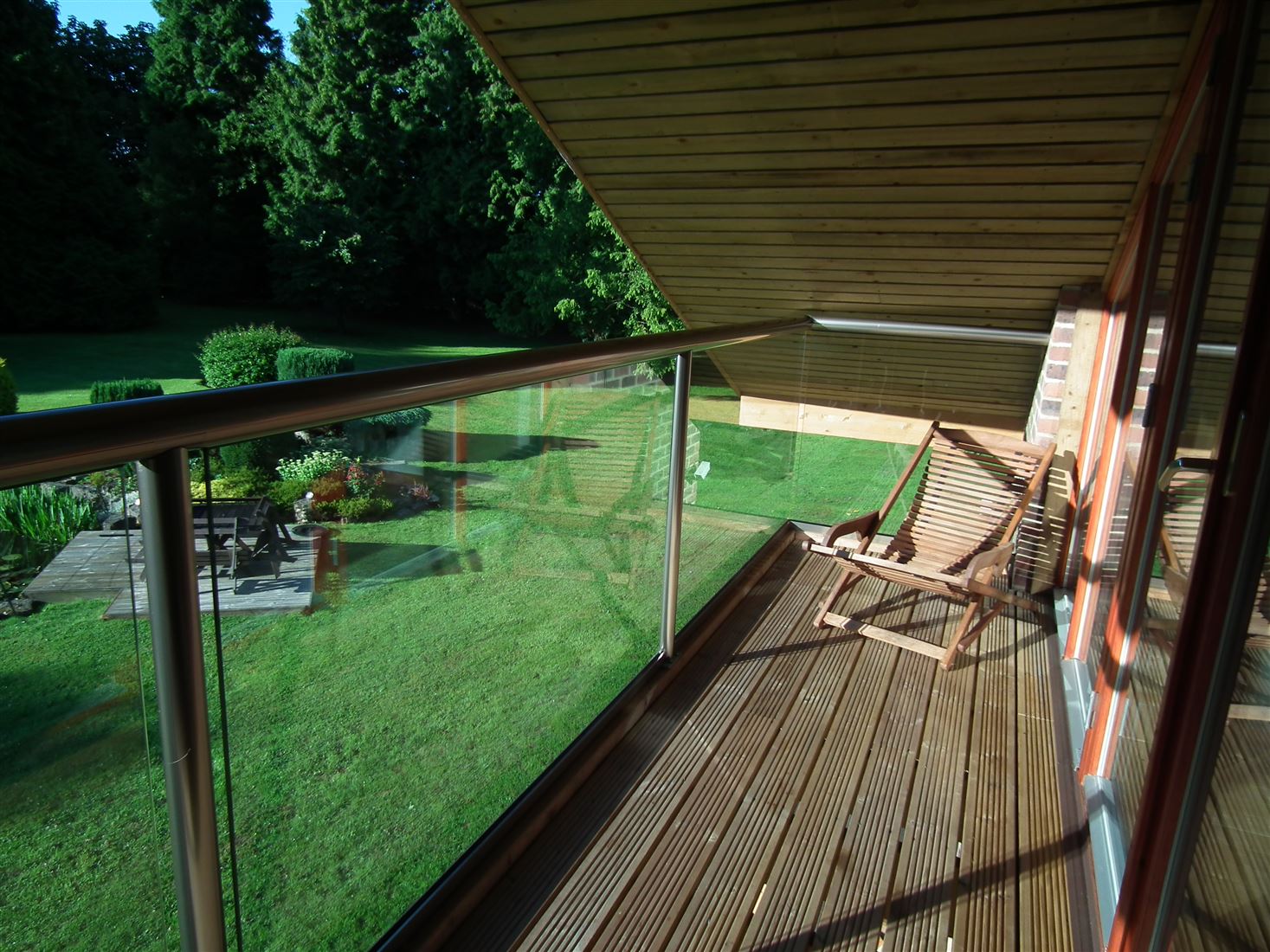 Royal Chrome Orbit Balustrade overlooking a beautiful garden