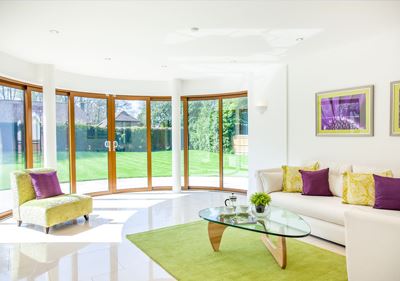 Curved Glass Sliding Doors with garden views