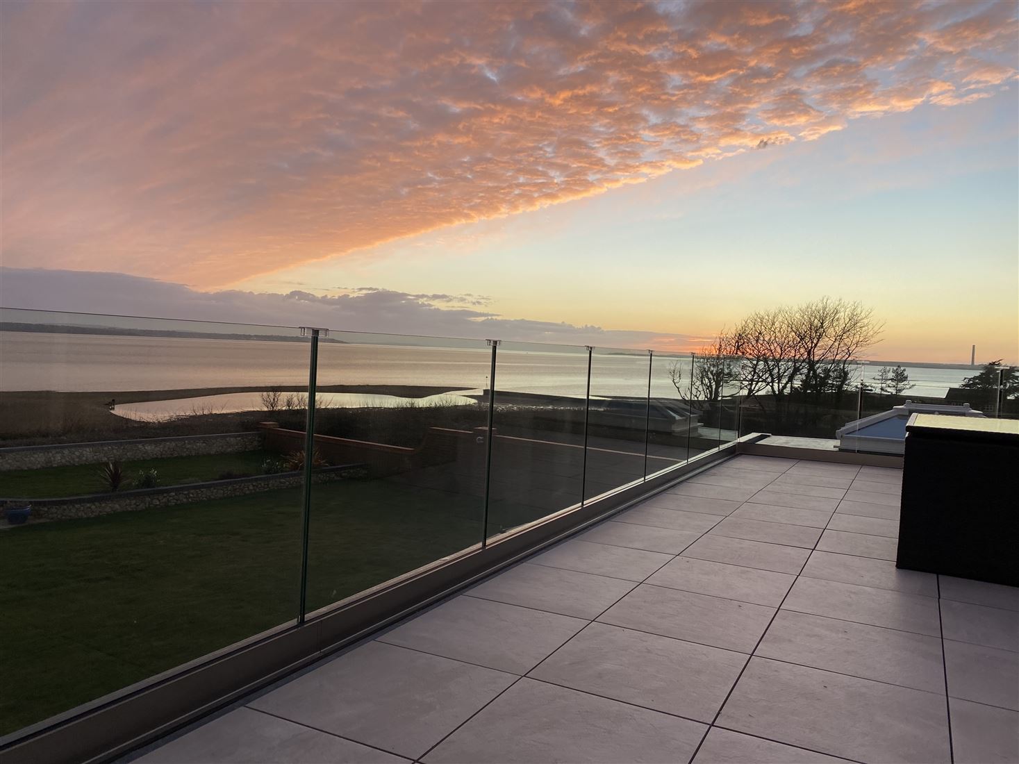 Beuatiful frameless balustrade at dusk