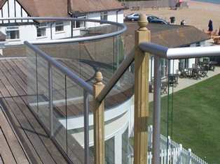 Glass Banister with silver handrails 