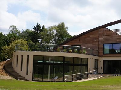 curved glass patio on a large modern building