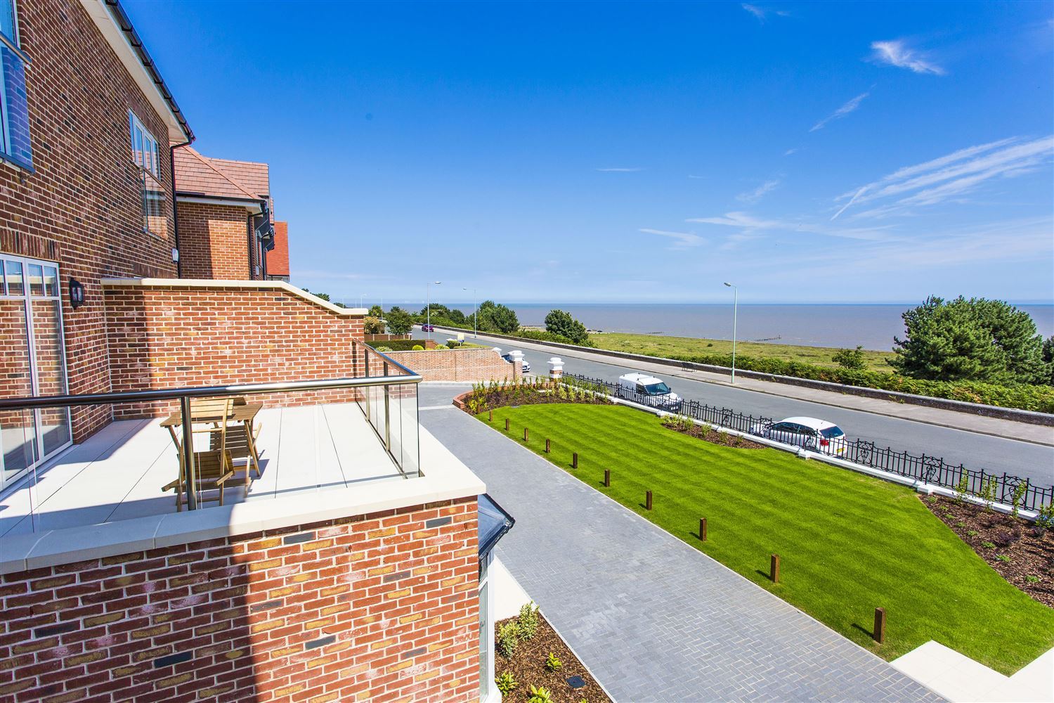 Orbit Glass Balustrading installed on a three-storey luxury villa overlooking the sea at Gunton near Lowestoft