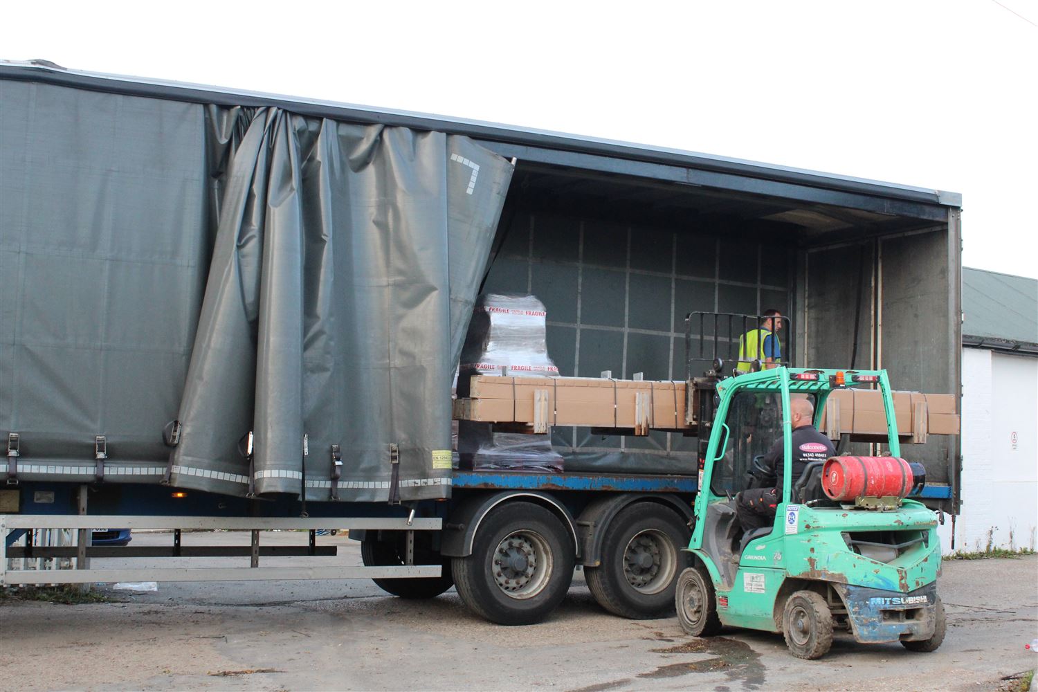 Pallet with balustrades being loaded