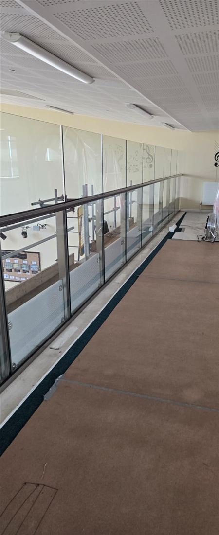 Non-climbable balustrade 1.8 metres high with clear glass for school walkways