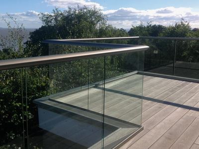 Bronze Aerofoil Glass Balustrade with Golden Oak Composite Decking