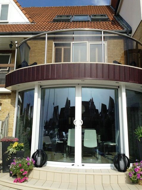 balcony and curved doors