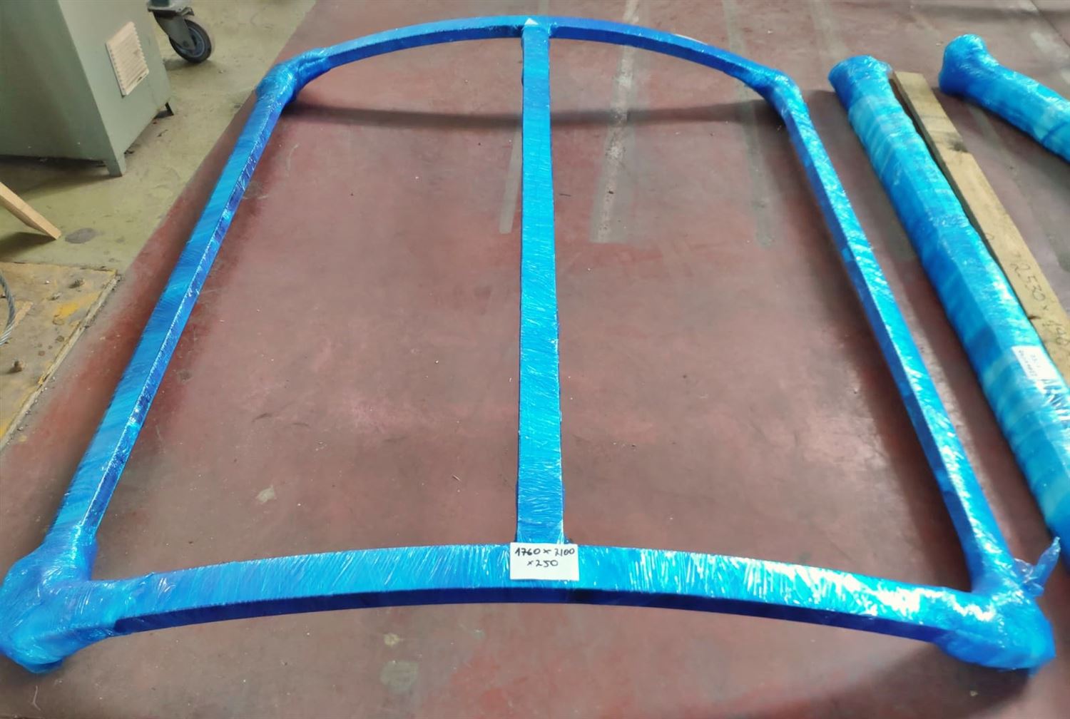 Curved Glass Door frame protectively wrapped ready for delivery 