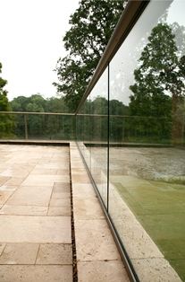 Glass Balcony with aerofoil handrail