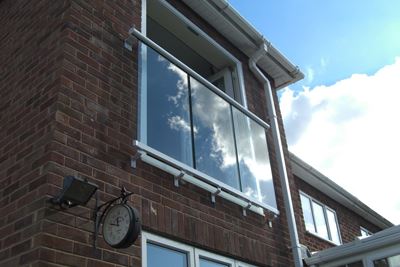 Silver Orbit Juliet Balcony reflecting the sky