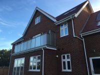 Glass balconies in Surrey