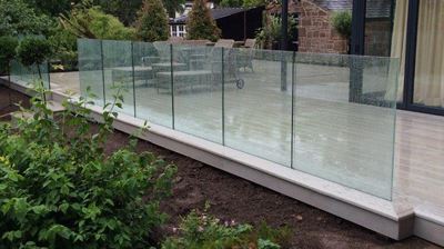 Glass Balustrade installed on an usual shaped house